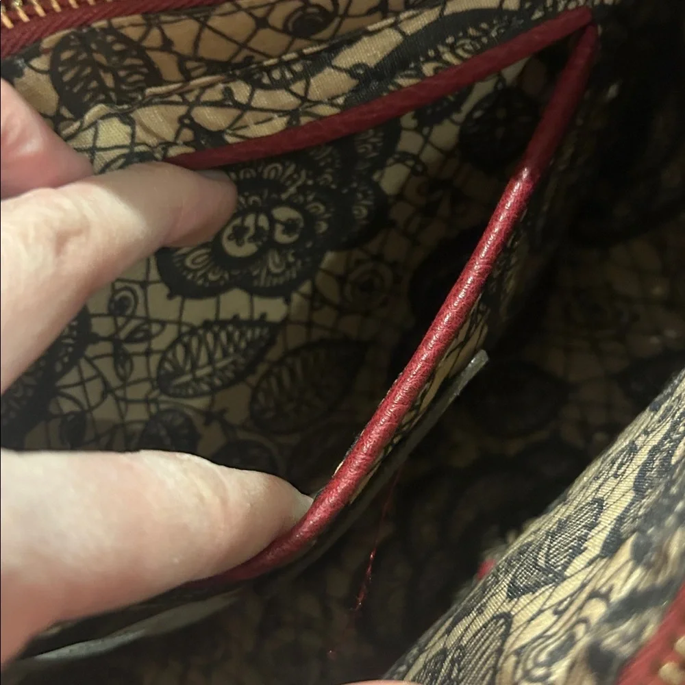 Carlos Santana faux pebbled leather maroon western crossbody bag laser cut rings
